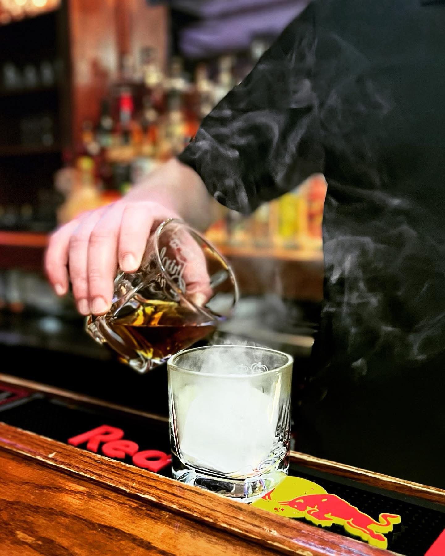 A cocktail being prepared at The Swizzle Stick bar